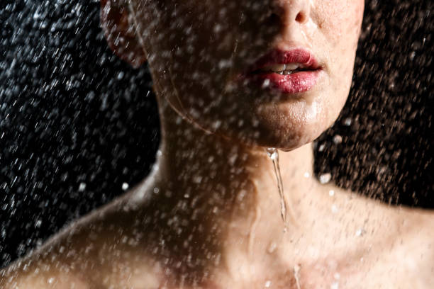 istock Woman under shower closeup 1500795550
