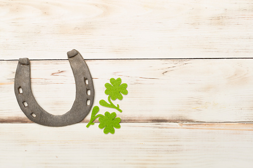 Lucky gold horseshoe on a white background with clipping path.