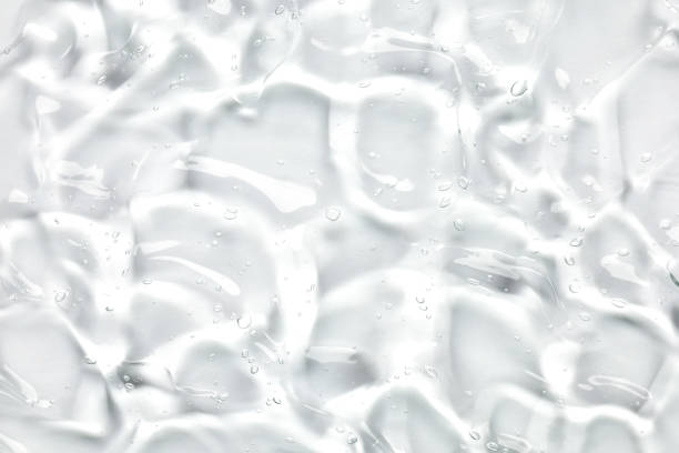 istock Serum texture, clear liquid gel with bubbles, cosmetic background 1500804070