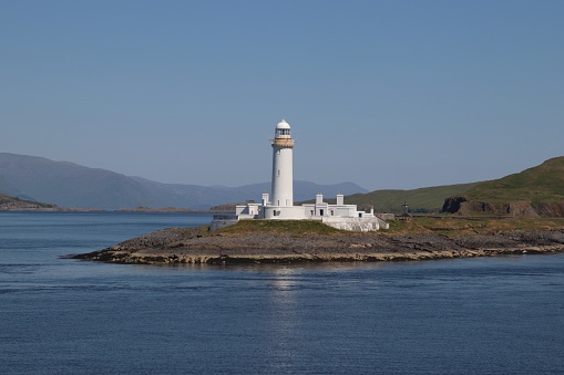 White lighthouse on island
