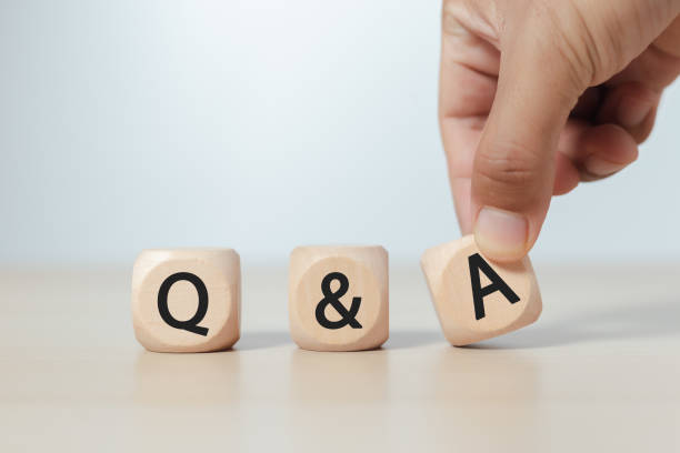 istock Question and Answer Concept. wooden block cube with text Q and A. communication information service. 1500809359
