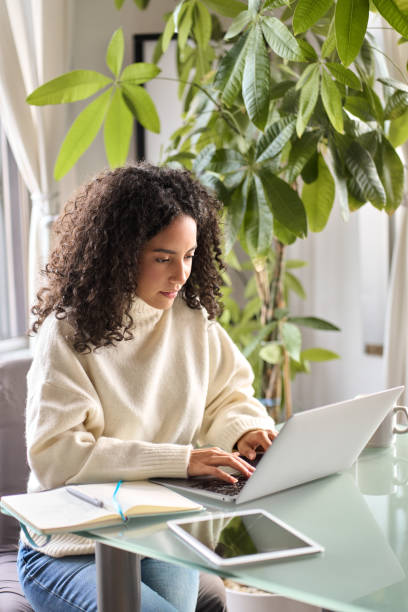 istock Young busy woman using laptop pc elearning online, searching job. 1500809775