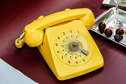 Old yellow phone