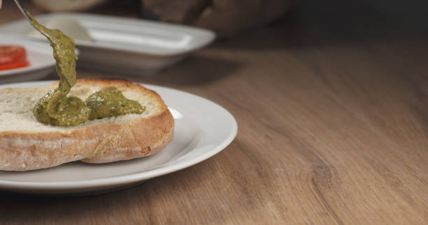 istock making italian sandwich with speck and mozzarella apply pesto 1500817465