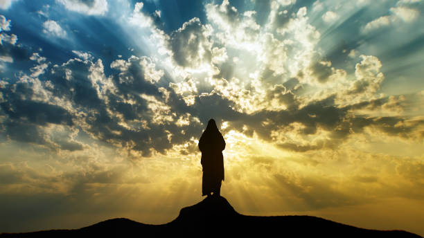 christus steht auf dem berg - schließen - contemplation sunset eternity thinking stock-fotos und bilder
