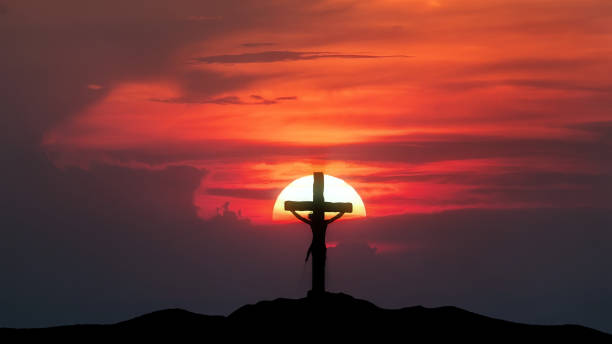 istock Holy Cross and big sun at sunset 1500818122