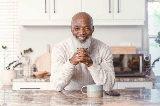 istock Handsome man drinking coffee at home 1500819121