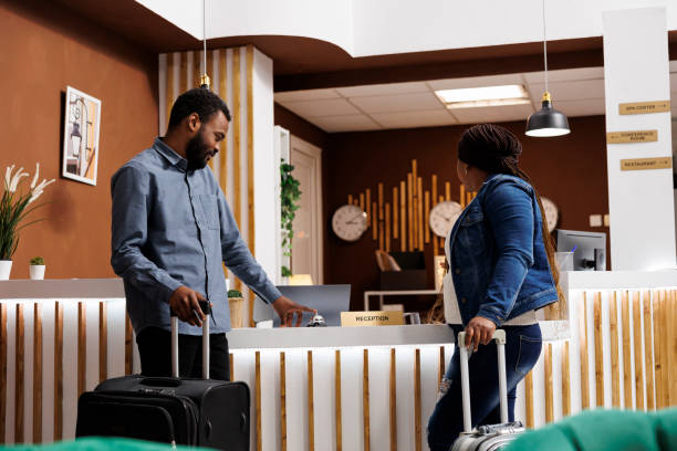 istock Couple pressing service bell at hotel 1500824703