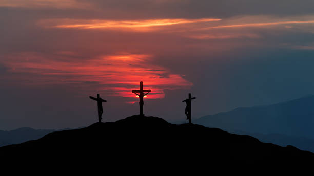 istock Silhouettes of three crosses at dusk 1500825394