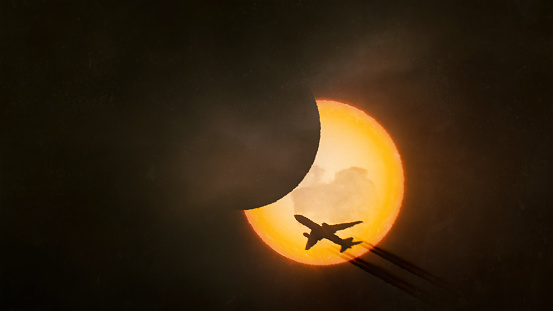 Solar eclipse with airplane