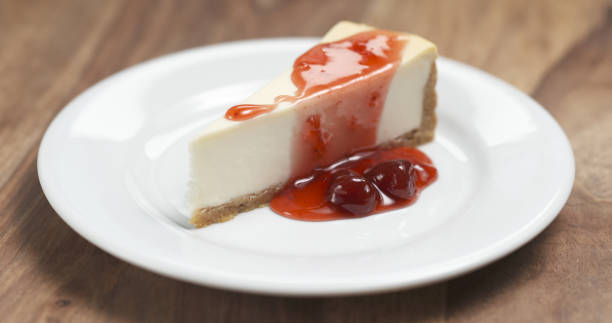 istock strawberry jam pour over traditional new york cheesecake 1500830096