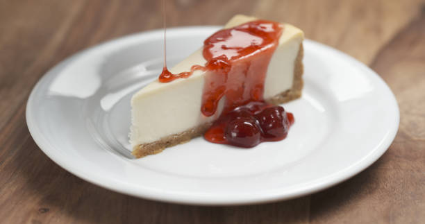 istock strawberry jam pour over traditional new york cheesecake 1500830161