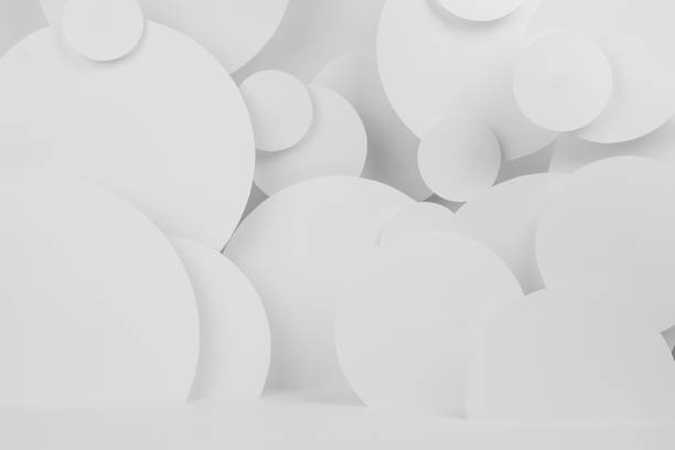 istock White abstract background of fly circles different size with perspective, floor, stage mockup for presentation cosmetic products, goods, advertising, design in elegant light modern purity calm style. 1500830389