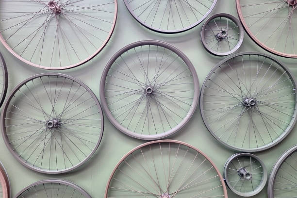 istock Background of bicycle wheels on the wall. 1500831310