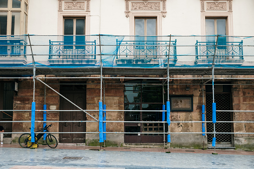 Building facade with scaffolding in Spain