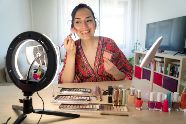 istock influencer live streaming her cosmetic review and recommendation online 1500833763