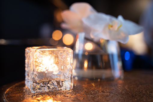 glass with candlelight Romance for a very special night.