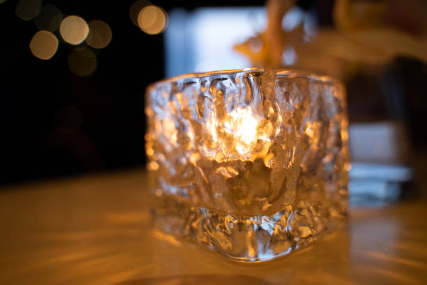 istock glass with candlelight Romance for a very special night 1500838935