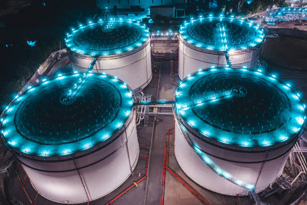 istock Oil storage spheres tank at night 1500839852