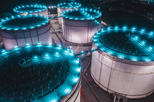 istock Oil storage spheres tank at night 1500839879