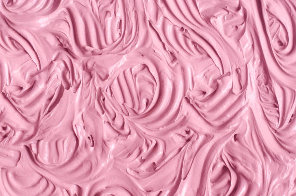 istock Rose cosmetic clay (make-up blusher, lipstick, alginate facial mask, berry body wrap) texture close-up, selective focus. Abstract background with swirl brush strokes. 1500840837