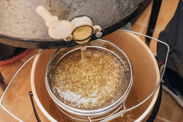 istock Extracting honey from the comb, harvesting 1500840999