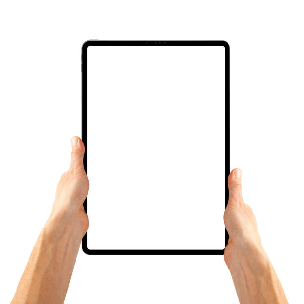 istock a tablet in a hand on the  white backgrounds 1500845342