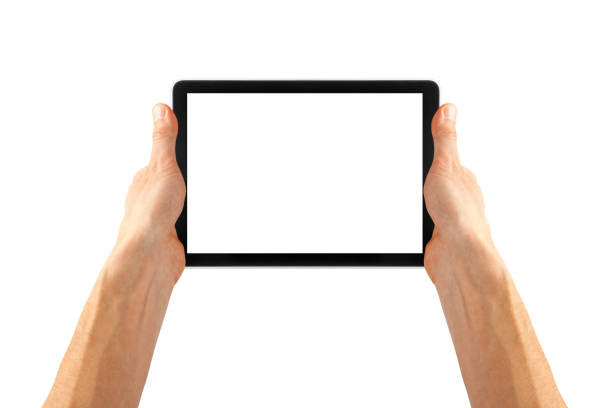 istock a tablet in a hand on the  white backgrounds 1500845722