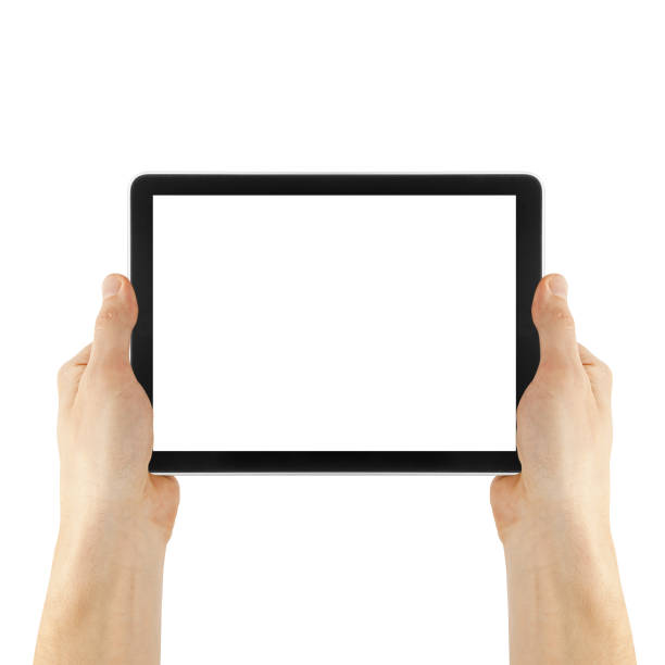 istock a tablet in a hand on the  white backgrounds 1500845753
