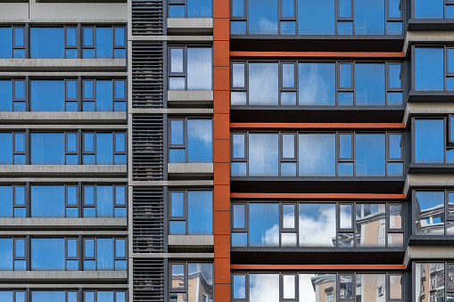 The geometric details of the facade of modern urban commercial and financial buildings