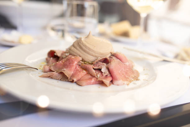 vitello tonnato served in a fancy restaurant