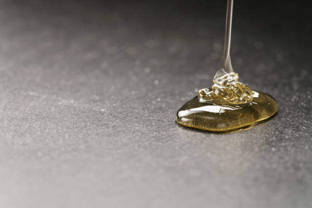 istock natural honey pour on slate board 1500856677