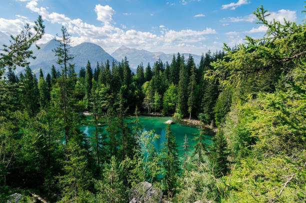 istock Blue and green mountain lake 1500856896