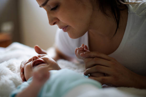 istock Mother and crying newborn baby 1500858022