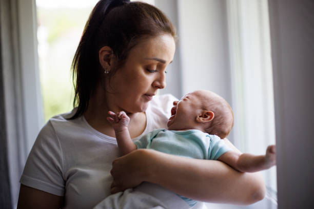 istock Mother and crying newborn baby 1500858068