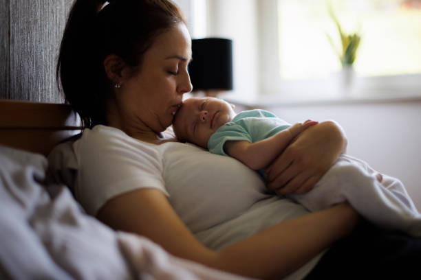 istock Sleeping baby and mother 1500858200
