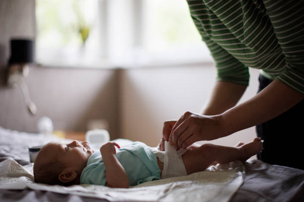 istock Mother changing baby´s diaper 1500858591
