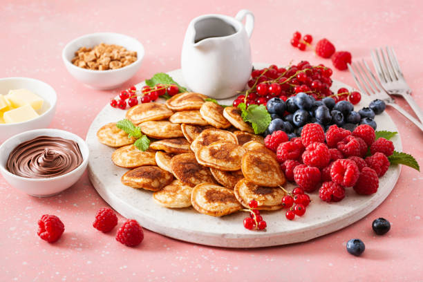 istock american mini pancake board with berries and maple syrup 1500862008