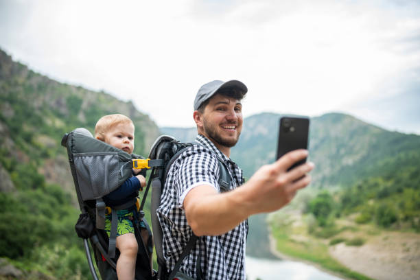 istock Dad taking a selfie with his little one while hiking. 1500865000