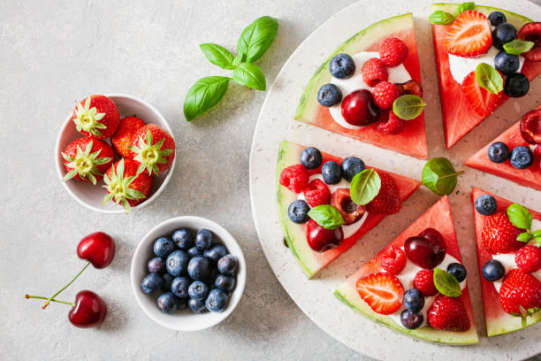 istock watermelon pizza slices with yogurt and berries, summer dessert 1500865229
