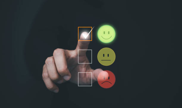 istock Customer service and Satisfaction concept ,Business people are touching the virtual screen on the happy Smiley face icon to give satisfaction in service. rating very impressed. 1500872112