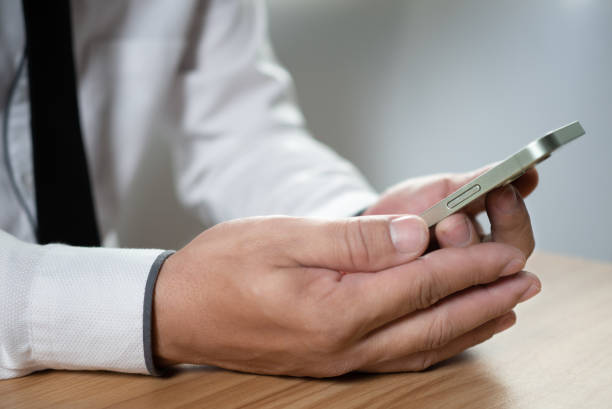 istock Business people use phones to communicate and work. communication technology concept 1500874156