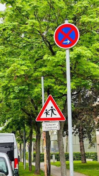 Absolute no-stop sign and warning sign for school children