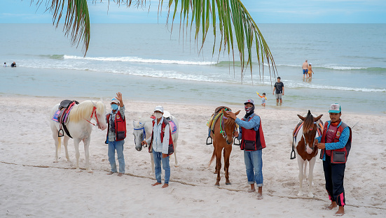 Horse Rental Hua Hin Beach, Trained horses serving tourists, Hua Hin, Prachuap Khiri Khan, Thailand, Jun 19, 2023.