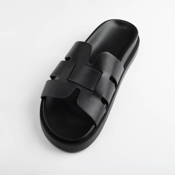 istock Black women's slippers for summer, shoes. Top view 1500875953