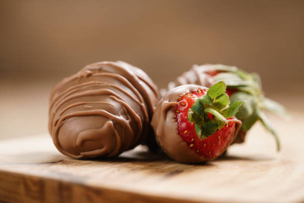 istock chocolate covered strawberries on wood board 1500876710