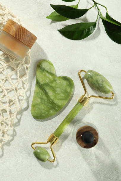 istock Face care concept with gua sha, face roller and cosmetic 1500879658