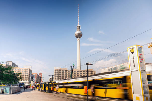 istock yellow cable car at station berlin Alexanderplatz 1500882192