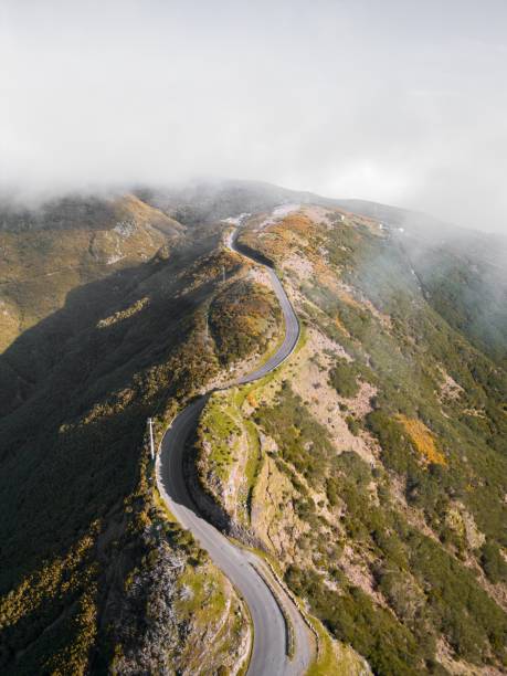 istock Scenic road winding through a mountainous landscape 1500885835