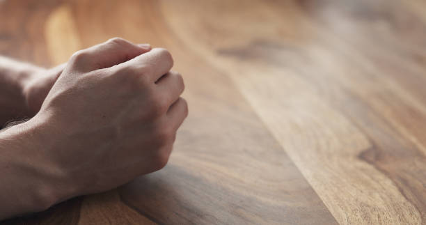 istock Young man hands gestures suggestions closeup at the meeting 1500885841